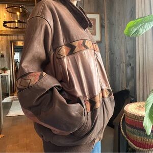 Vintage Adler leather bomber jacket with an Aztec or Southwestern pattern